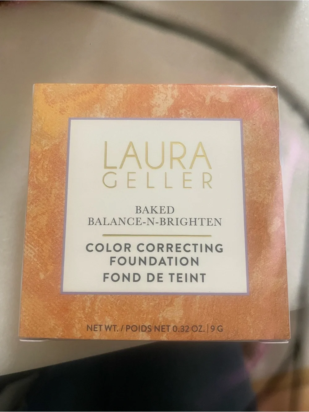 Laura Geller baked balance-n-brighten color correcting powder foundation LIGHT